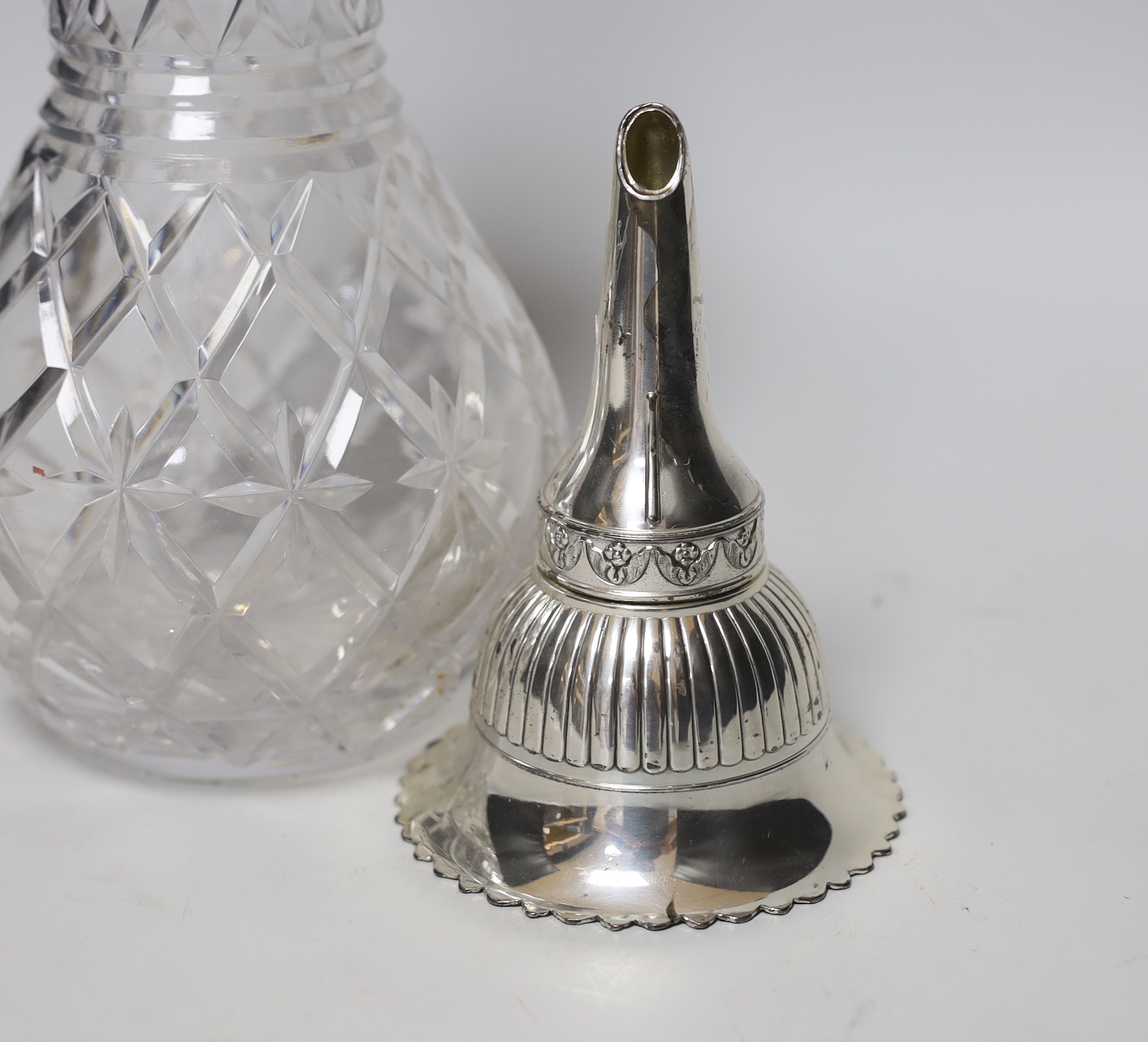 A plated claret jug and wine funnel, 31cm